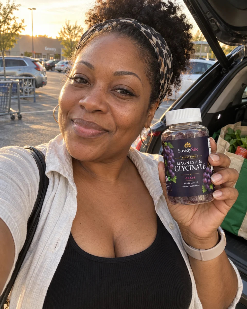 Rosa holding her bottle beside a parked car